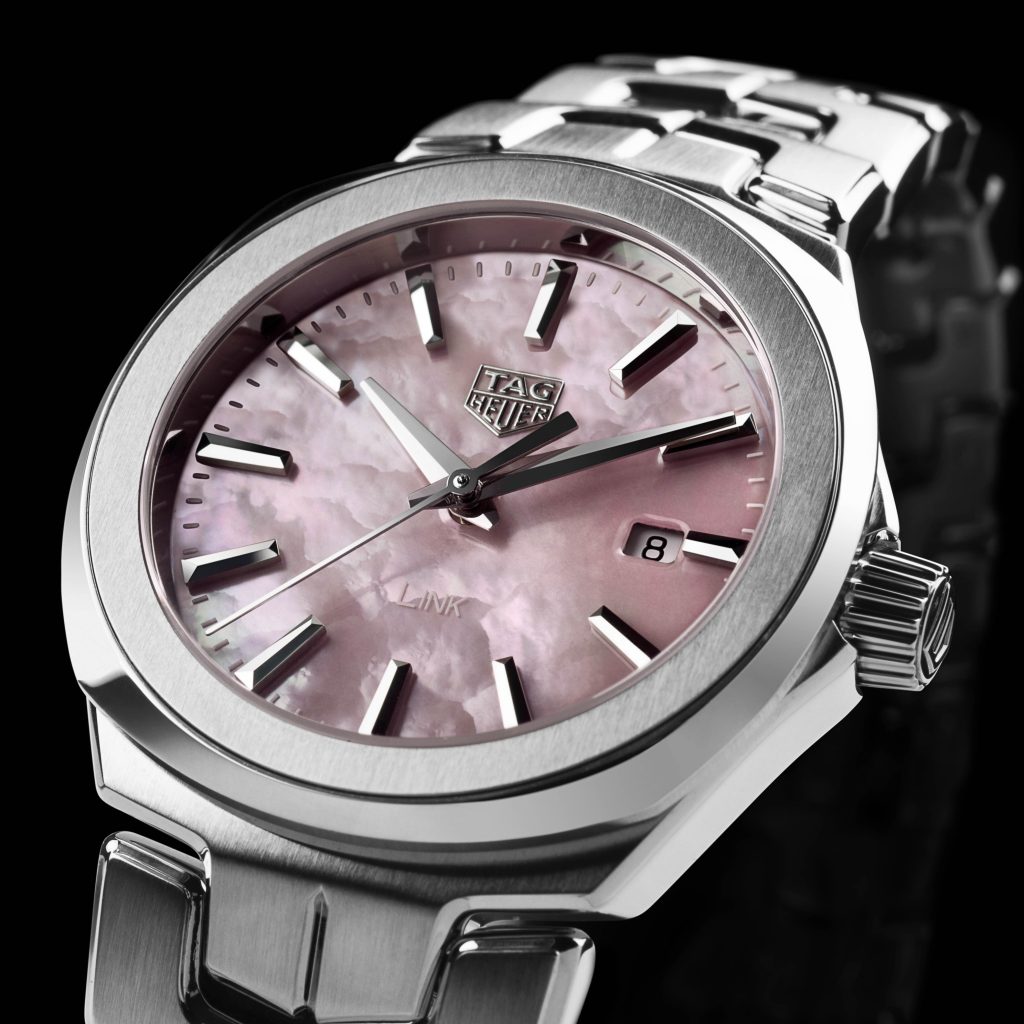 The female fake watch has pink dial.